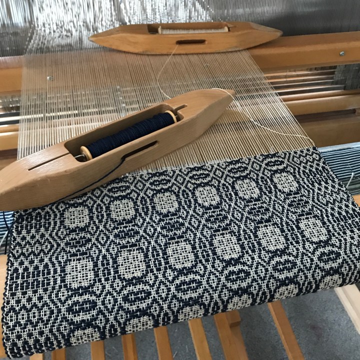 Navy and ivory on loom